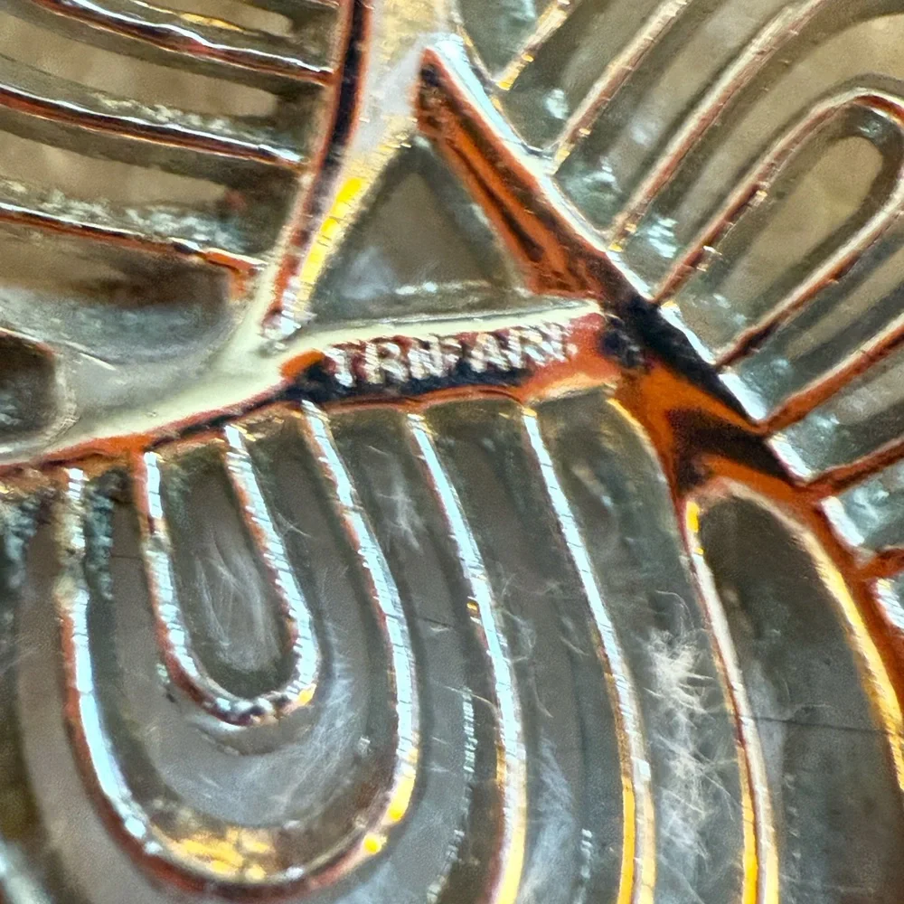 Vintage Trifari silver-tone swirl brooch Women’s costume jewelry